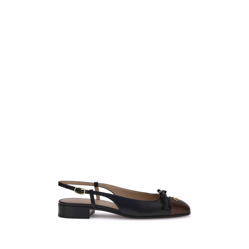 Black sandal with a small heel on a white background