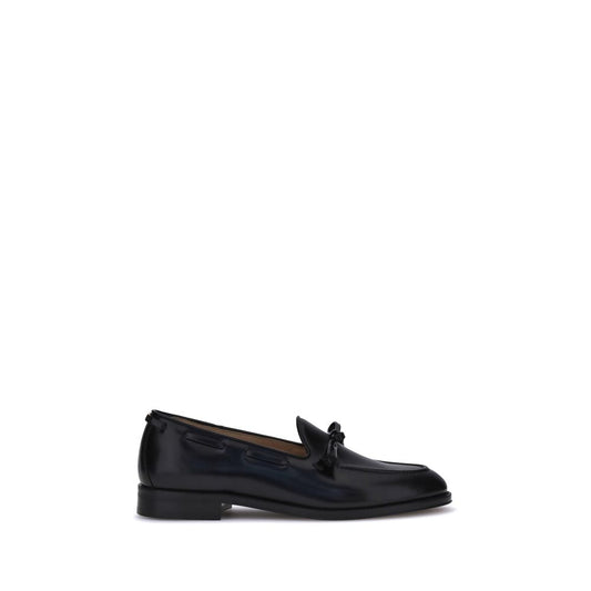 Black loafer shoe on a white background