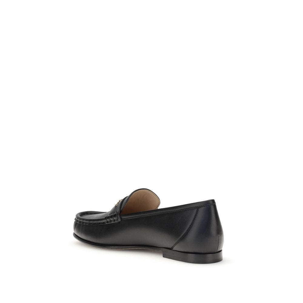 Chloé – Black Leather Loafers with Gold Chain Logo